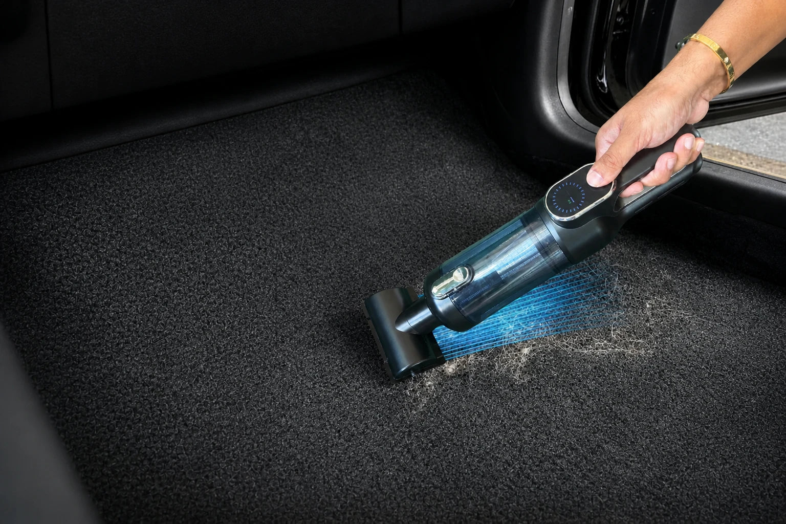 Luminoire AutoCare lifting embedded debris from car carpet